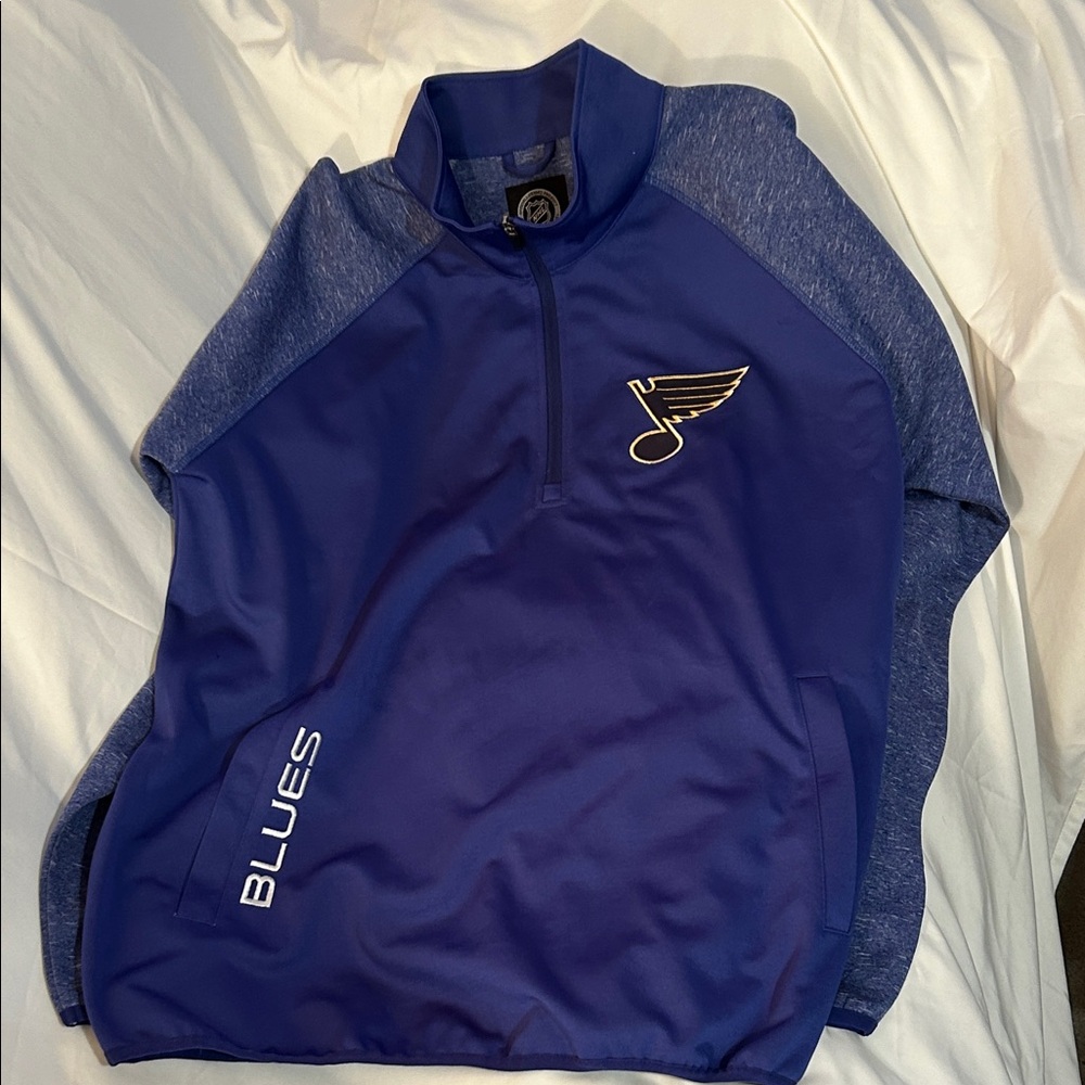 Blues long sleeve pullover w/ 1/4 zip neck. 2 side slide pockets size XL
